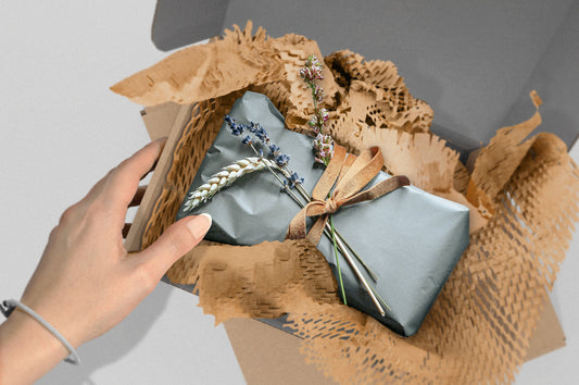 person opening an eco-friendly package to show sustainable packaging trends in 2023